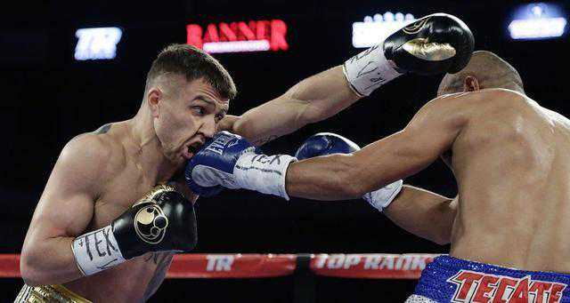 洛马琴科7回合TKO夺金腰带 “高技术”现天才威力